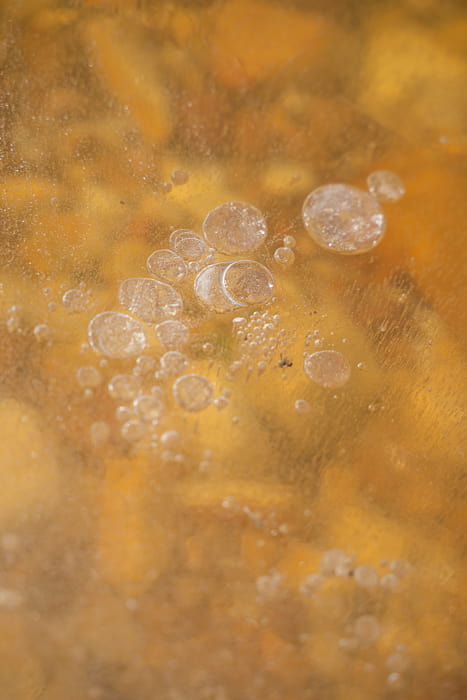 The water was completely see through and froze sticks and even air pockets. Photo Jay Caboz Image