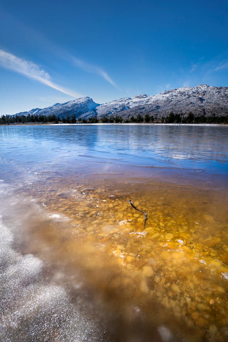 Frozen dam with the Matroosberg mountain range in the background. Shot at 17mm 1/40th second at f8 with ISO 50. Photo Jay Caboz Image