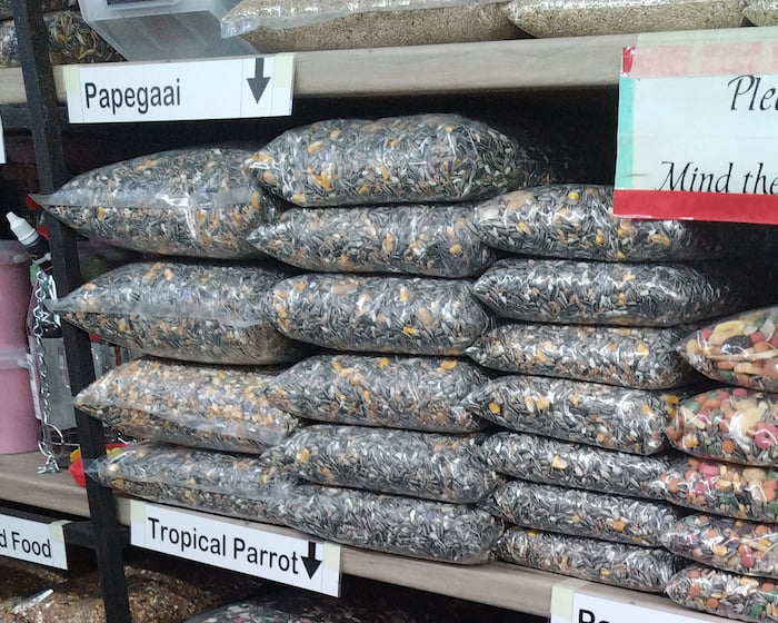 Feed bags full of sunflower seeds sold as “Parrot Food”. While sunflower seeds are acceptable as a snack, they can be deadly for a parrot if eaten in large quantities. Feed bags full of sunflower seeds sold as “Parrot Food”. While sunflower seeds are acceptable as a snack, they can be deadly for a parrot if eaten in large quantities.