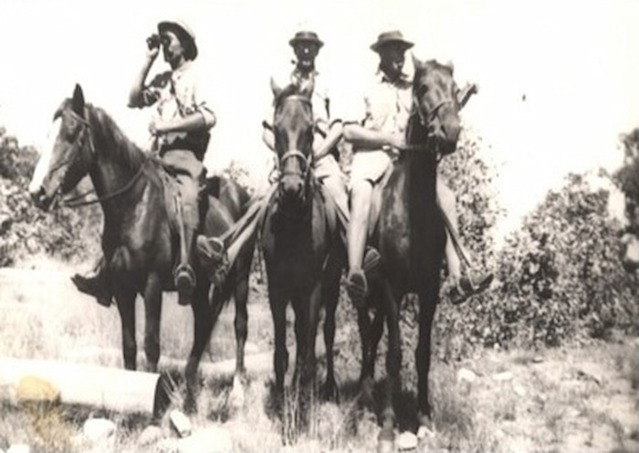 The three game wardens on horse patrol in the game reserve. The three game wardens on horse patrol in the game reserve.