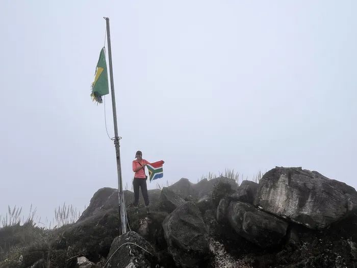 Summit Posing with Flagpole