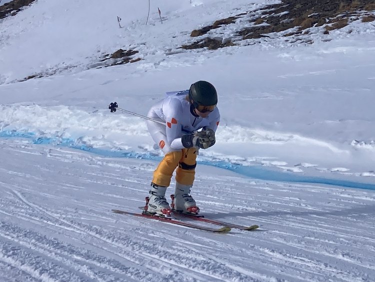 An incredible photo of someone skiing down the slopes. 